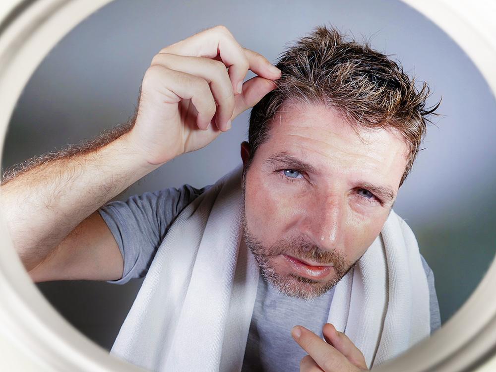 Stress can turn hair gray -- and it's reversible